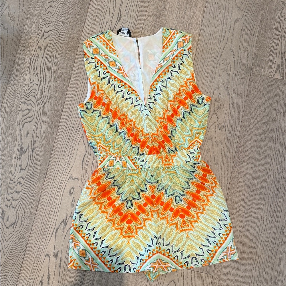 Bebe Orange and Yellow Patterned Jumpsuit